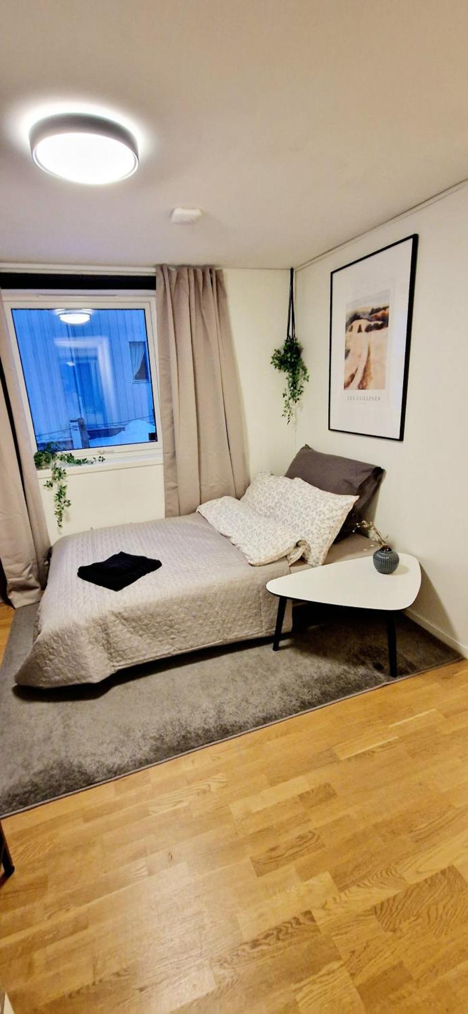 In Tromso, Located Between The Arctic Cathedral And The Cable Car *