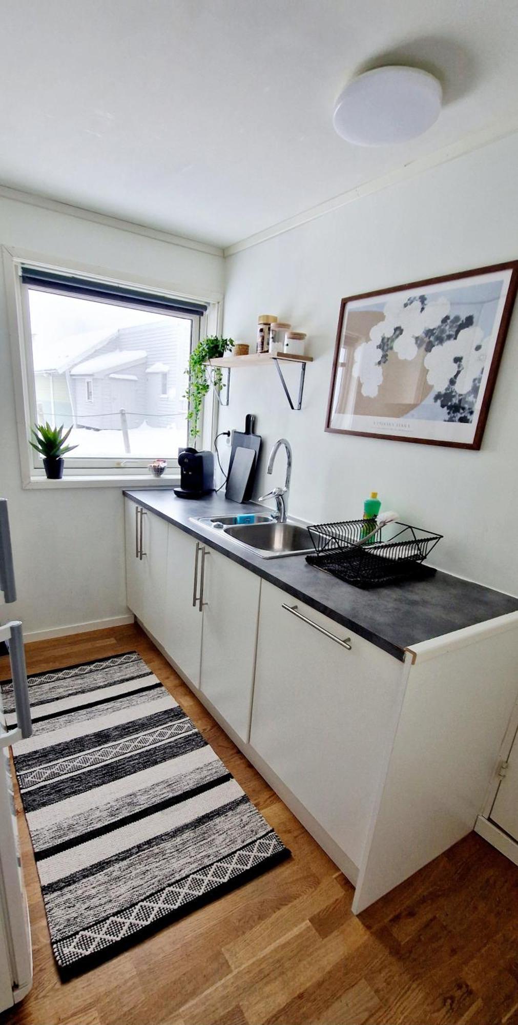 In Tromso, Located Between The Arctic Cathedral And The Cable Car * Tromso
